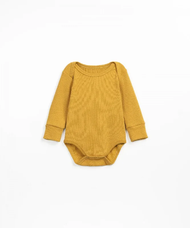 Ribbed bodysuit in organic cotton - Dijon